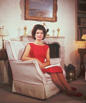 Fashion photos of Jackie Kennedy Onassis - jacqueline kennedy in red dress in armchair.jpg